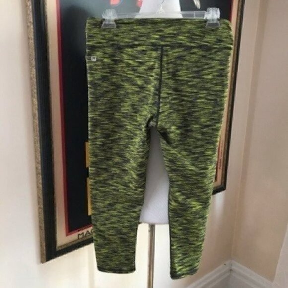 Fabletics: Heathered Salar Mid-Rise Capri Leggings - Picture 2 of 8